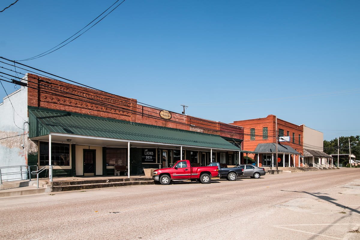 Pressure washing in Blooming Grove TX downtown storefronts