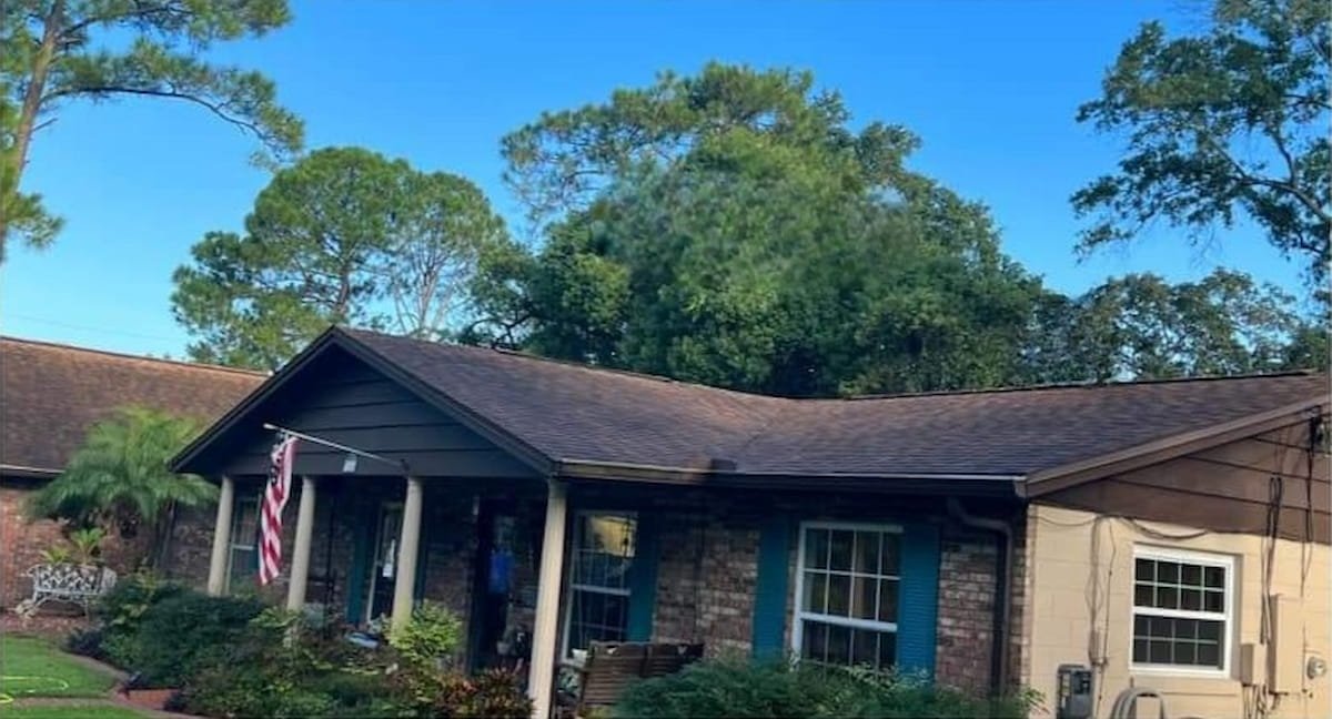 Home before roof washing and house washing in Blooming Grove, TX