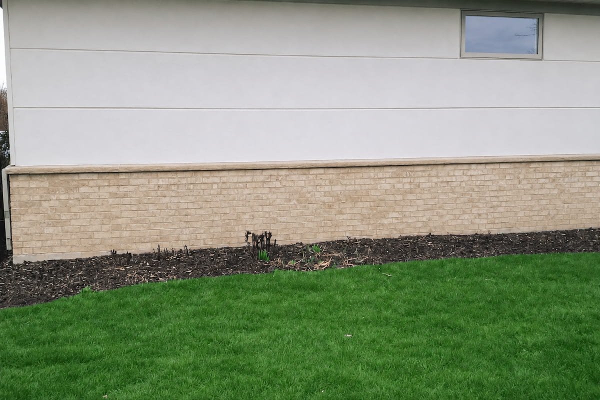 Brick wall after rust and irrigation stain removal