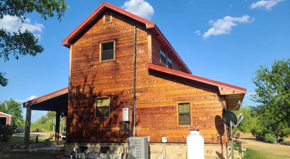 Wood house after cleaning and sealing in Kerens, TX